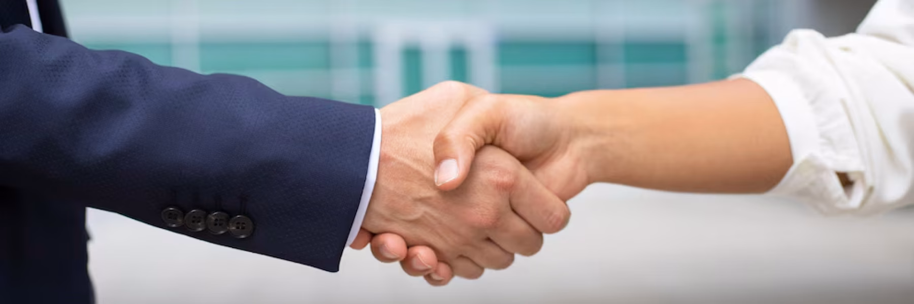 closeup-shot-business-handshake-cropped-shot-two-people-wearing-formal-suits-shaking-hands-business-handshake-concept_1262-21017